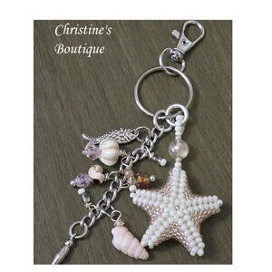 Sold Handmade beaded star fish purse charm,bag charm, starfish charm,